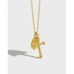 Modern Round Cross Necklace in Yellow Gold