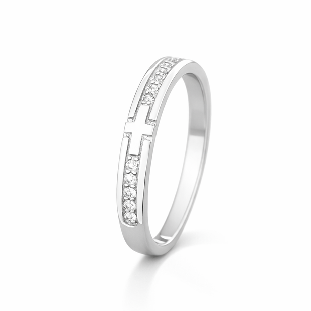 Silver ring with small diamonds on a white background