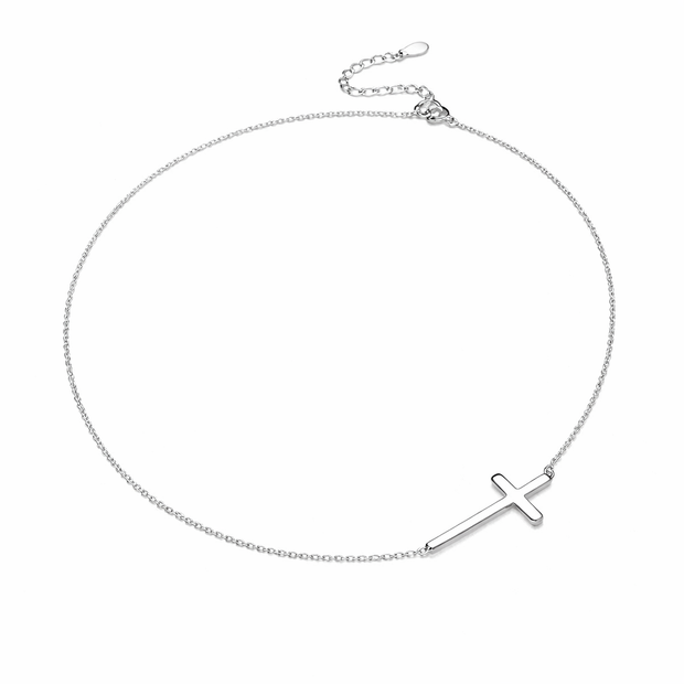 Silver necklace with a cross pendant on a white background