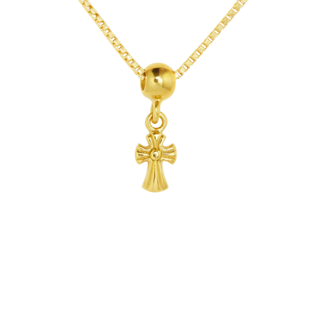 Gold necklace with a cross pendant on a white background